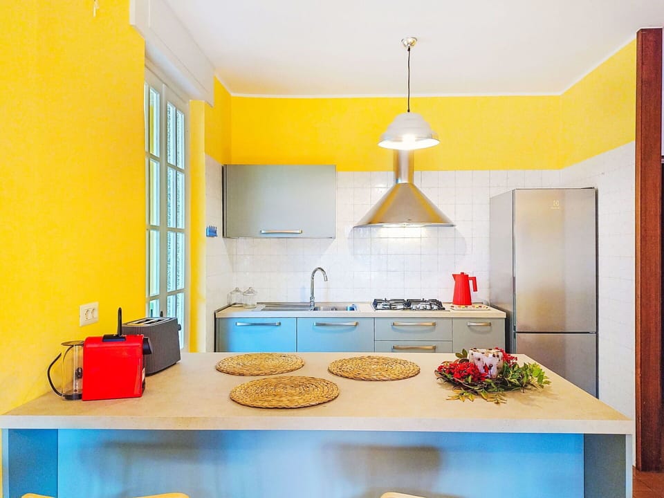 Interior Design, Furniture, Flooring, Wall, Floor, Yellow, Ceiling, Kitchen, Wood, Countertop