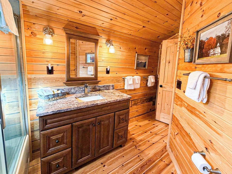 Spacious upstairs bathroom with a tub/shower.