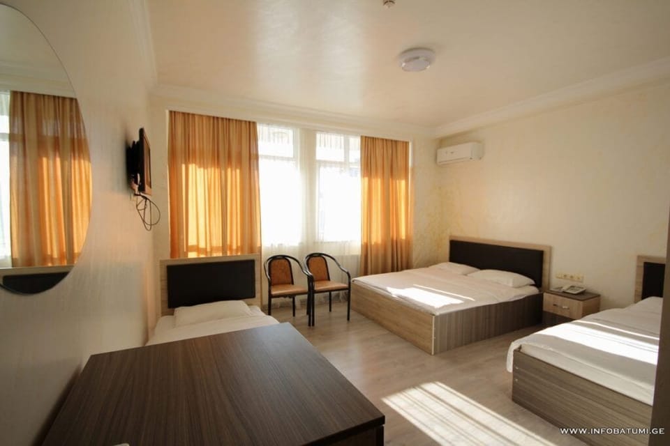 Family Room, Balcony | Desk, free WiFi