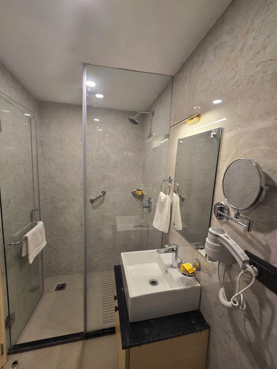 Shower, free toiletries, hair dryer, slippers