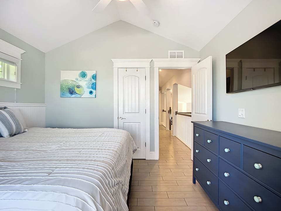 Top floor- Guest bedroom with balcony and access to guest bathroom