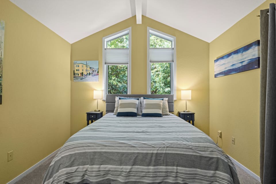 Tasteful and cozy the upstairs bedrooms with comfortable queen beds.