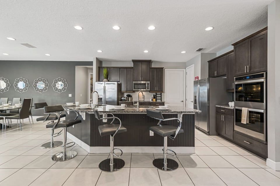 Mix, Mingle, and Enjoy in This Open Kitchen Bar Space