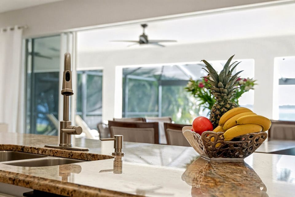 A chef-inspired kitchen made for easy gatherings. Granite countertops, modern fixtures, and an open layout that flows effortlessly into dining and outdoor spaces.