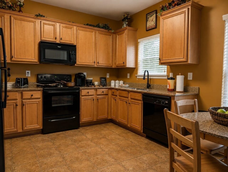 Fully equipped kitchen with everything you need to prepare home-cooked meals during your stay.