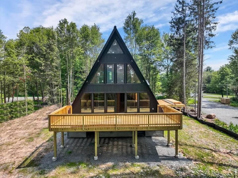 Front View of A-Frame Cabin w/ Elevated Deck