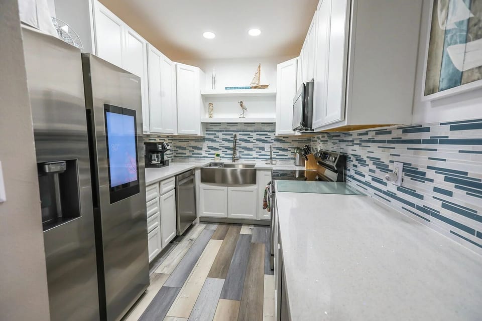 Modern kitchen with clean lines and coastal-inspired finishes.