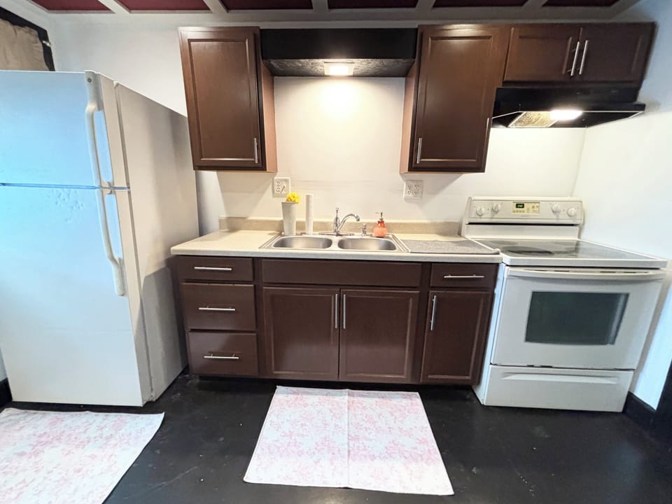 Kitchen full stove and oven for baking along with an air fryer