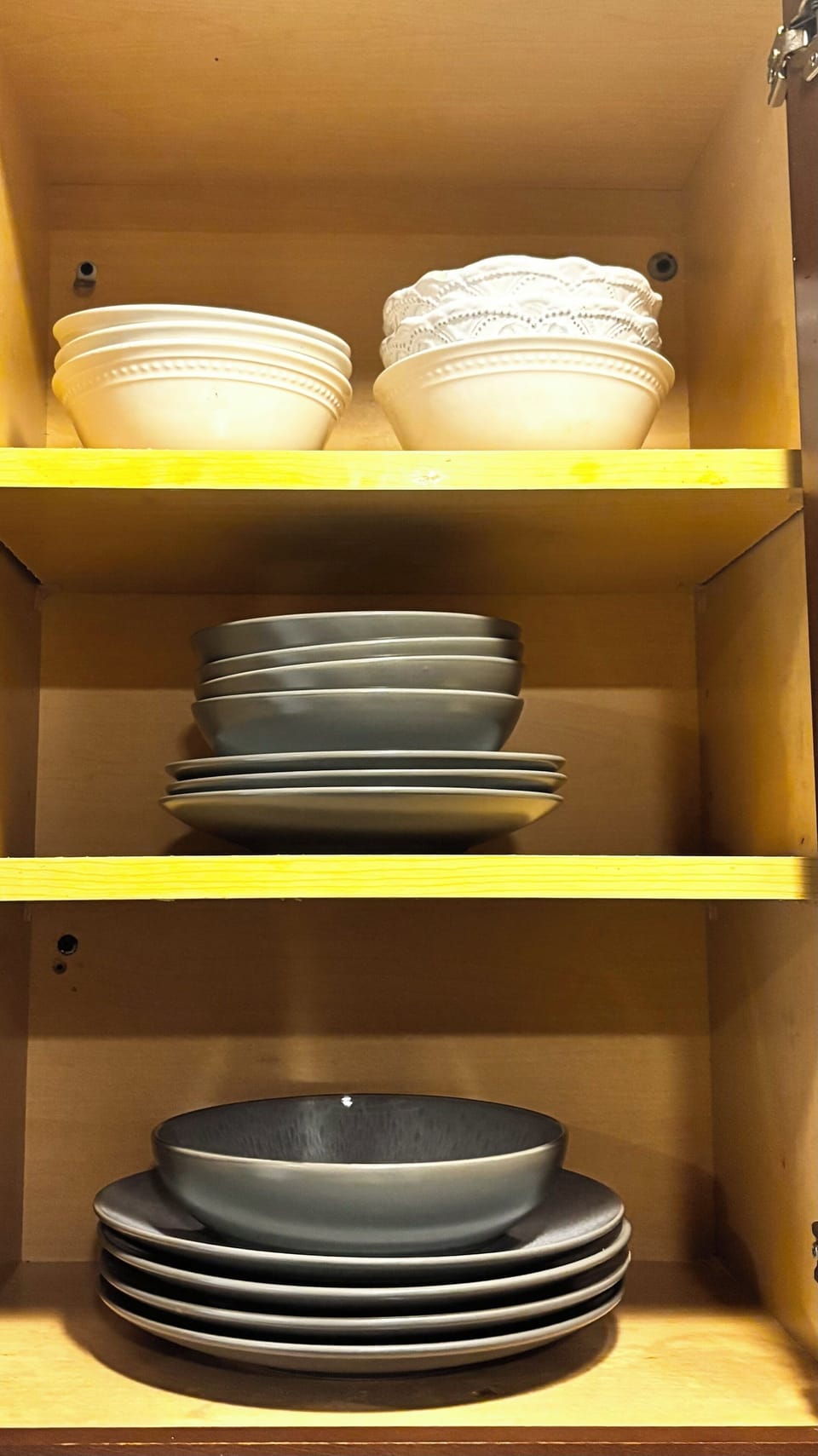 Dishes in kitchen cabinets