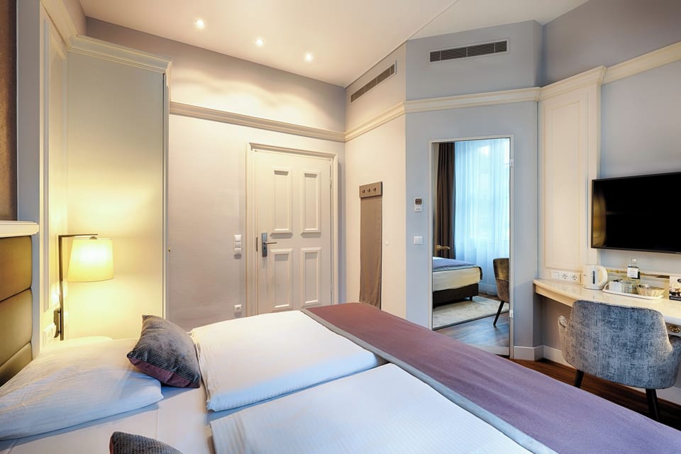 Superior Double Room (Plus) | In-room safe, desk, blackout drapes, iron/ironing board