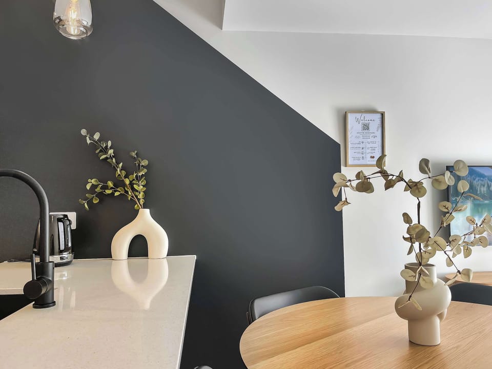 Elegant dining space with modern lighting and décor