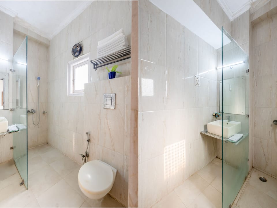 Shower, free toiletries, hair dryer, slippers