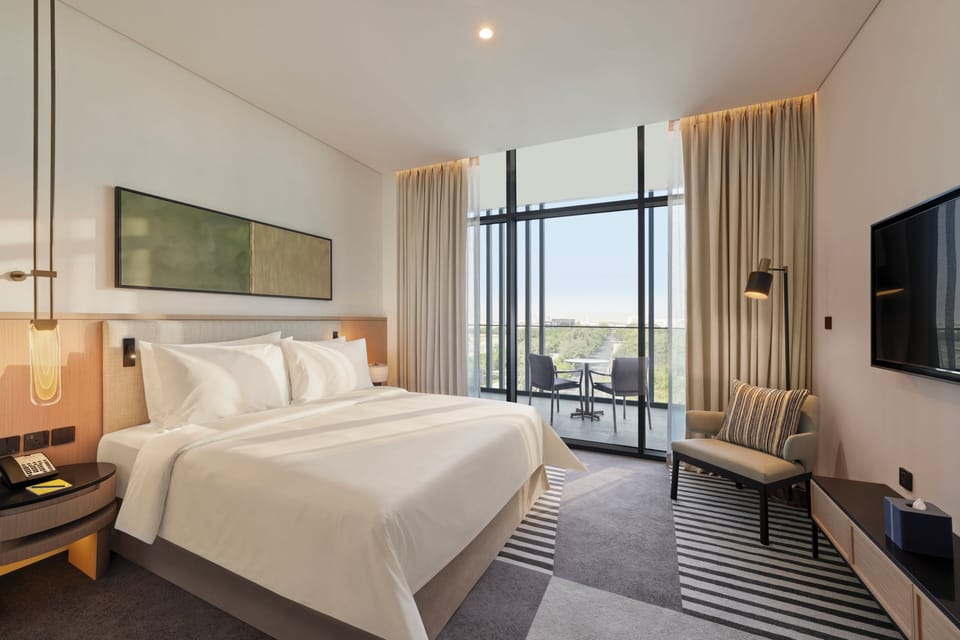 Exclusive Suite, Balcony (Boulevard View) | Minibar, in-room safe, blackout drapes, iron/ironing board