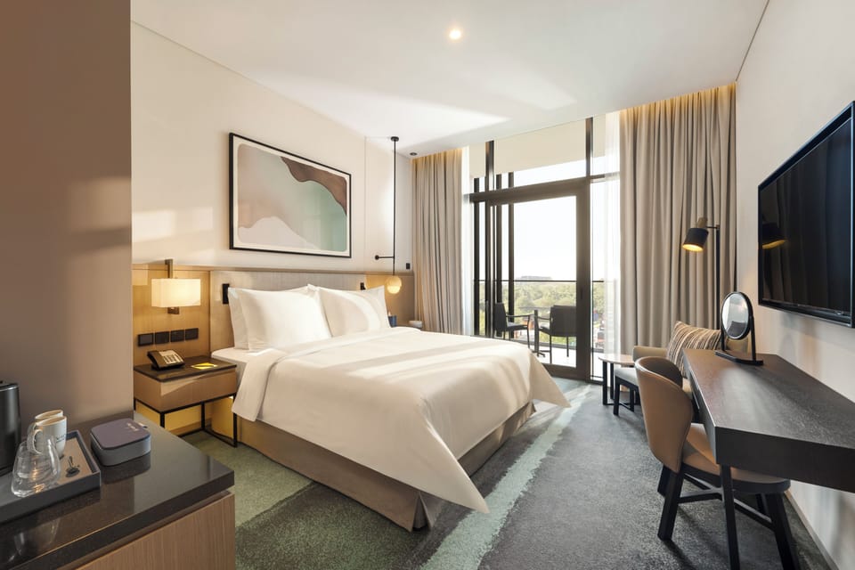Deluxe Room, 1 King Bed, Balcony (Boulevard View) | Minibar, in-room safe, blackout drapes, iron/ironing board