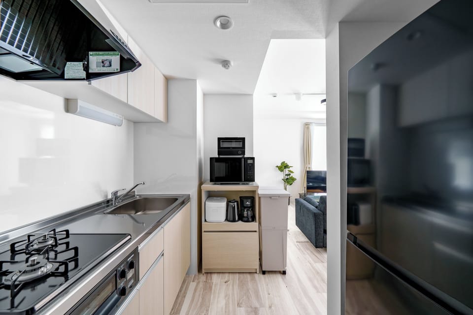 Apartment | Private kitchen | Fridge, microwave, stovetop, rice cooker