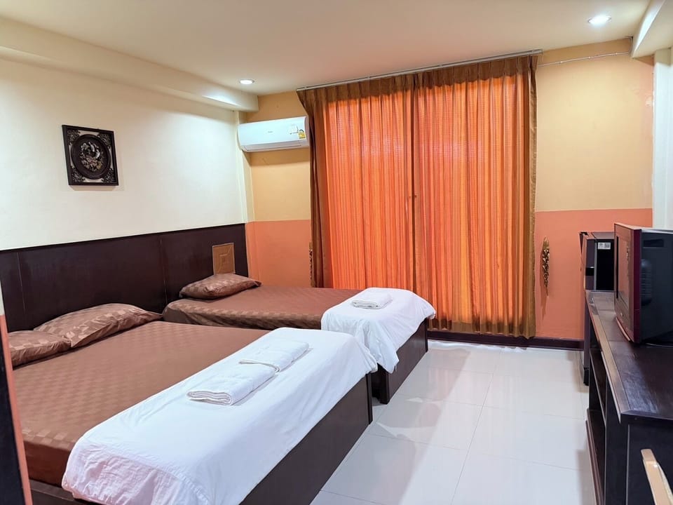 Family Triple Room, Garden View | Free WiFi