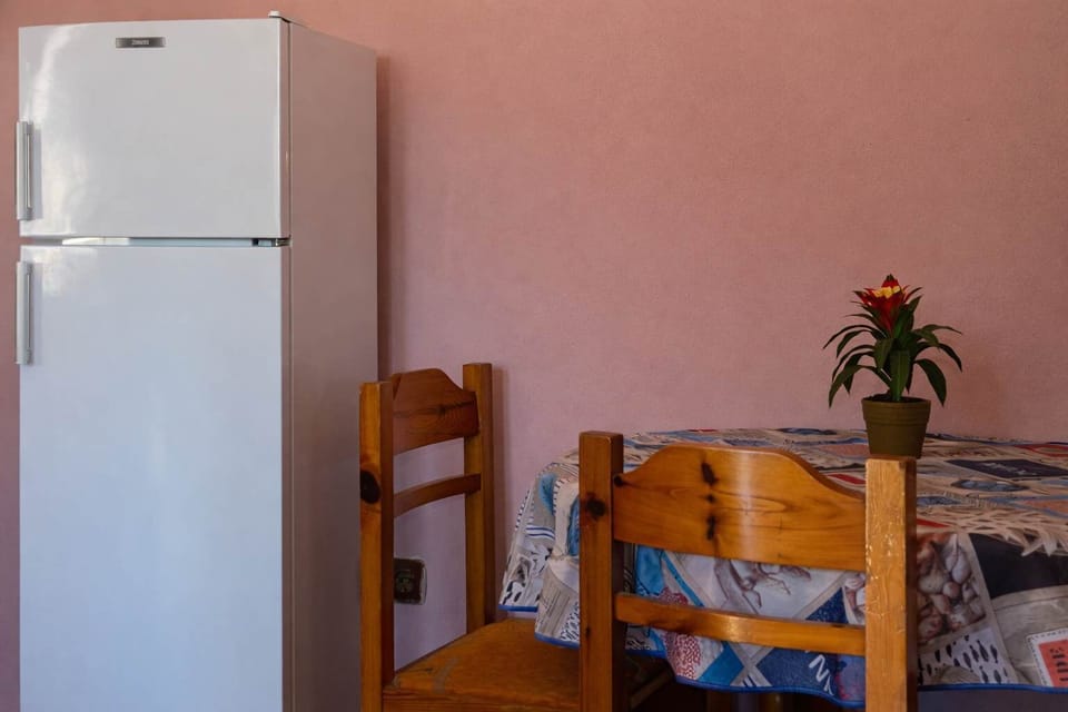 Dining space and kitchen area for easy, everyday meals.