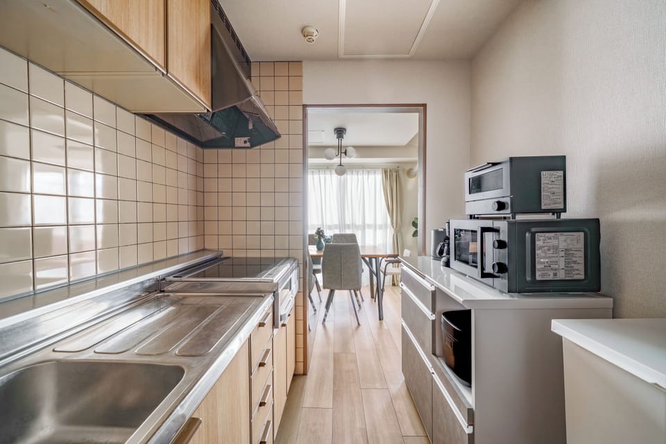 Apartment | Private kitchen | Fridge, microwave, stovetop, rice cooker