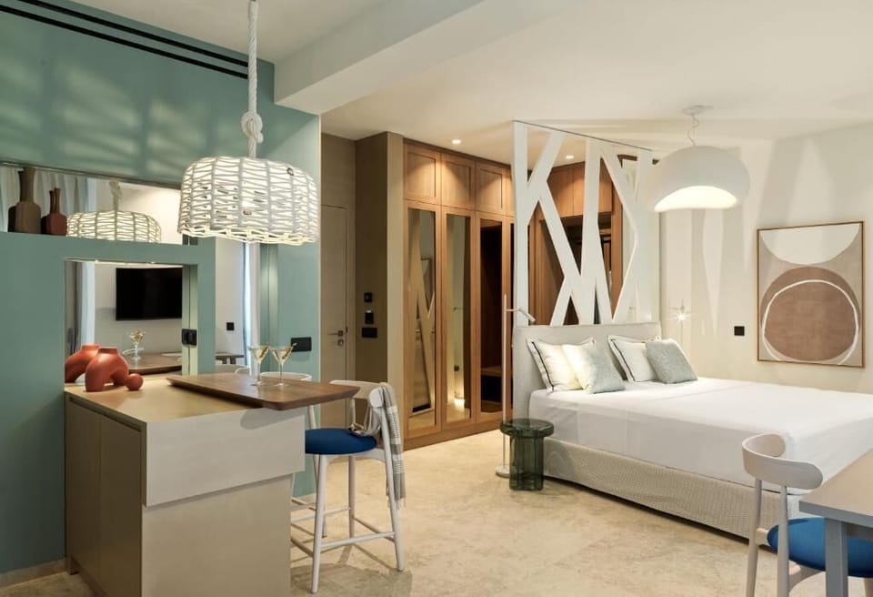 Junior Suite with Private Pool and Extended Terrace | In-room safe, desk, laptop workspace, soundproofing