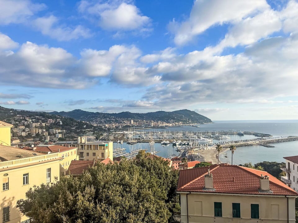 Sky, Daytime, Building, Horizon, Residential Area, City, Town, Urban Area, Summer, Hill