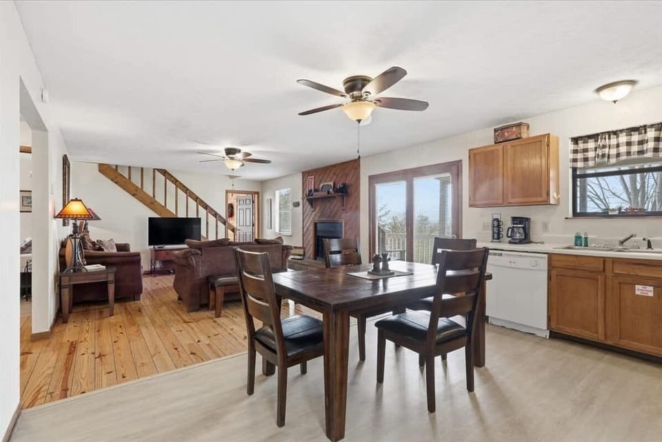 Relax in your spacious open-concept living space where the kitchen flows seamlessly into the dining and living areas, perfect for sharing meals and making memories.