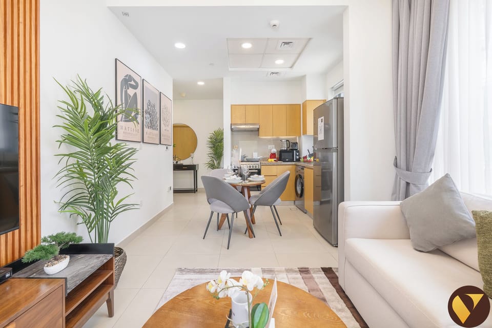 Luxury Apartment, Balcony, Canal View | Living area | 65-inch Smart TV with cable channels