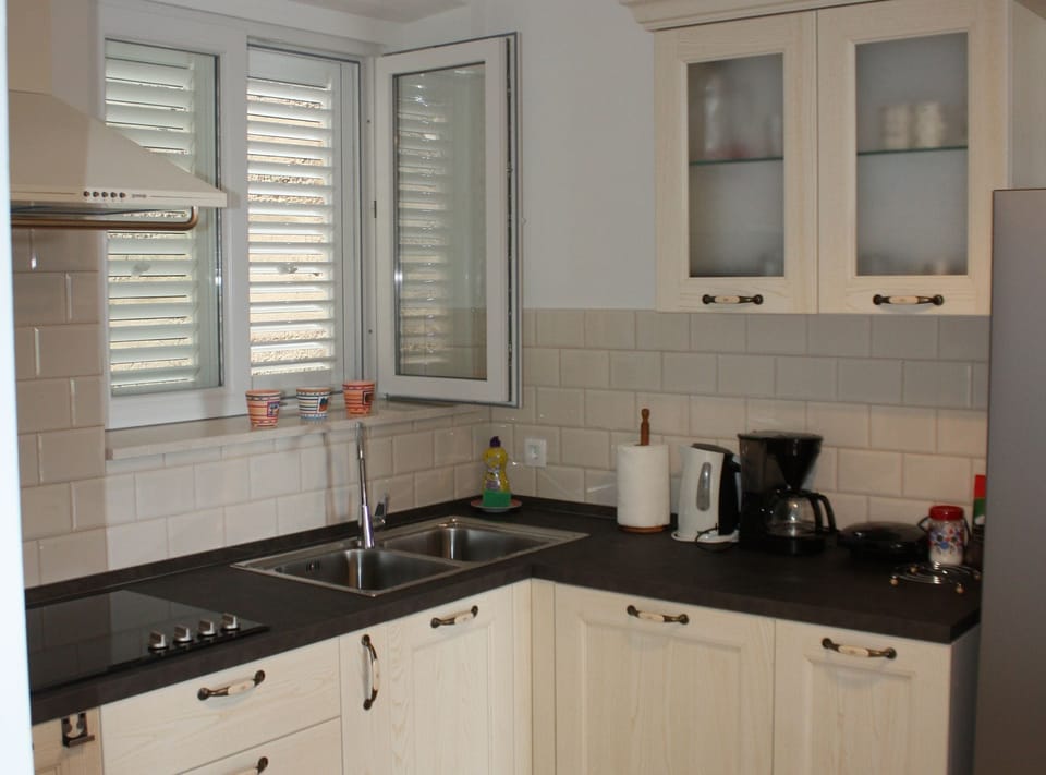 Apartment (Three Bedroom Apartment with Sea View) | Private kitchen | Fridge
