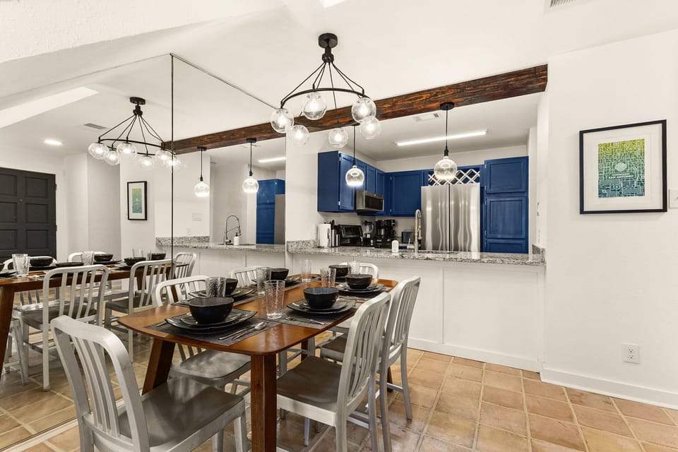 Full dining setup near kitchen for easy meal service