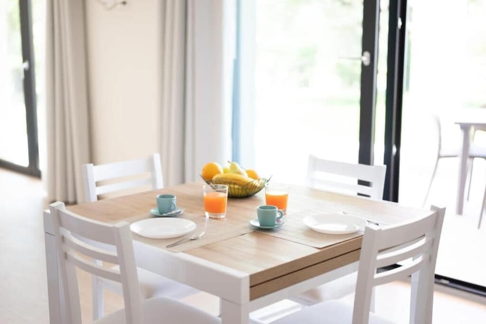 Apartment, Patio, Lake View | Dining