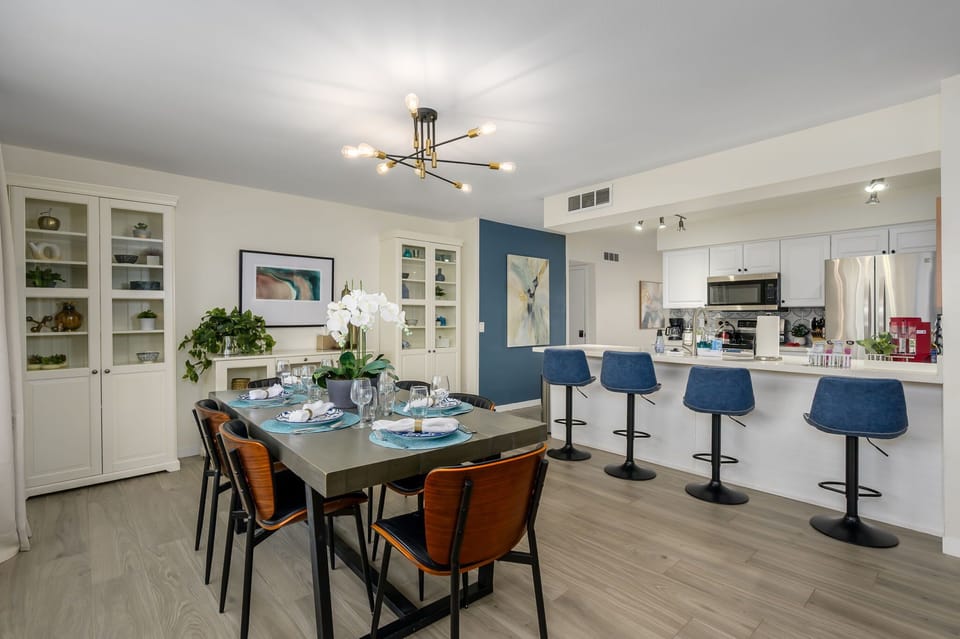 Open-concept dining and kitchen with seating for the whole group.