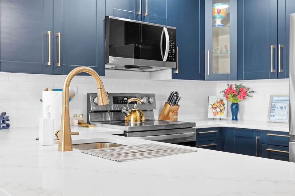 Fully equipped stainless steel kitchen.