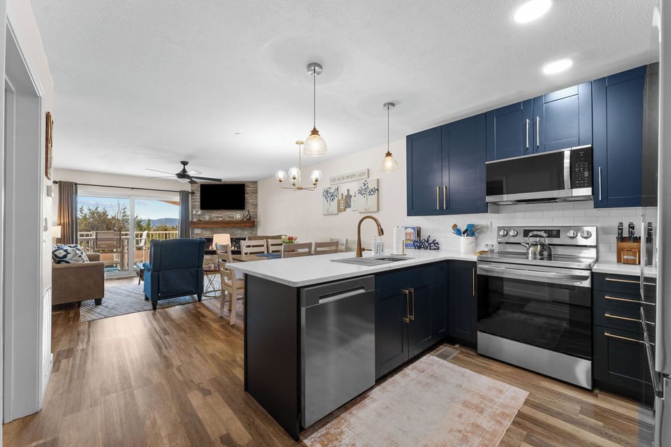 Fully updated kitchen with stainless appliances and quartz countertops.