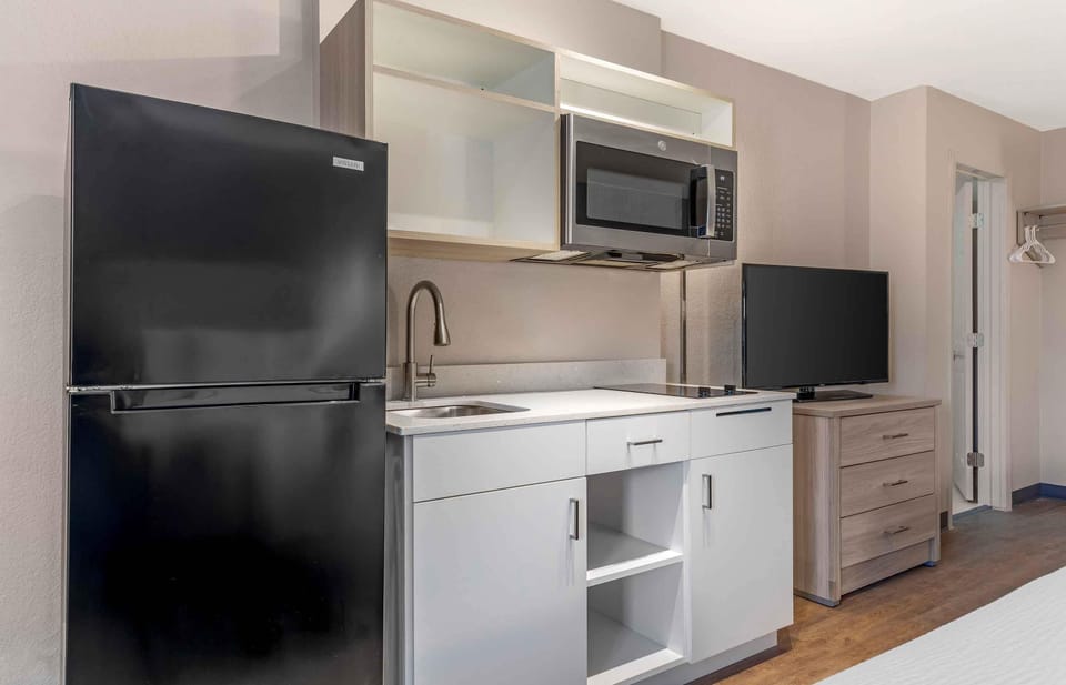 Standard Studio, 2 Queen Beds | Private kitchen | Fridge, microwave, stovetop