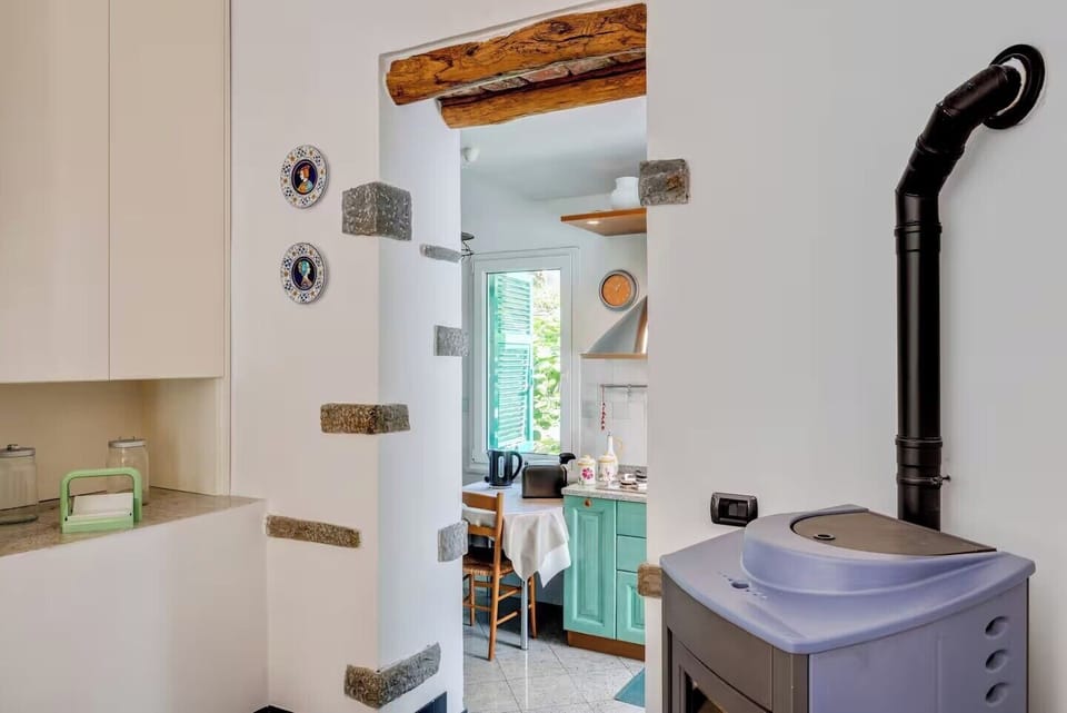 Apartment | Private kitchen | Full-size fridge, oven, stovetop, cookware/dishes/utensils