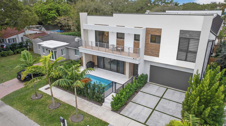 Where modern design meets relaxed coastal living - Welcome to Tarpon River Enclave