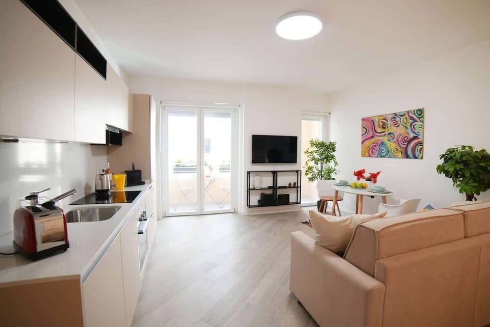 The studio is 46 square meters with kitchen and balcony.