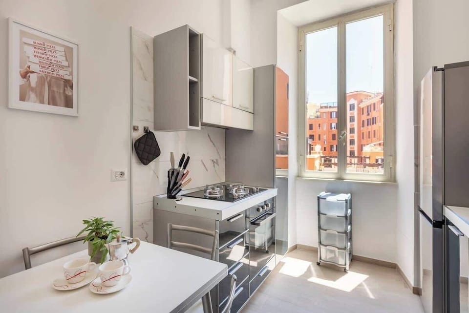 Stove, microwave, fridge, cutlery and pans and pots....