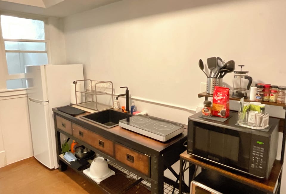 Deluxe Apartment, 2 Bedrooms, Kitchen, Courtyard View | Private kitchen | Fridge, microwave, stovetop, coffee/tea maker
