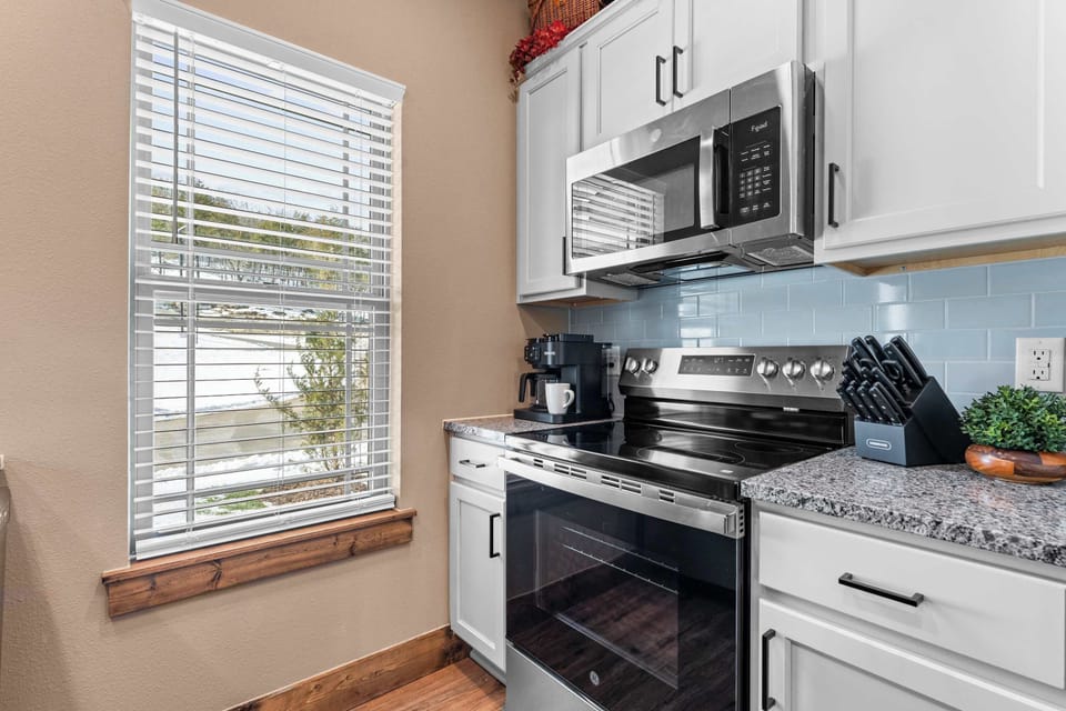The open kitchen offers ample space & all the comforts of home​