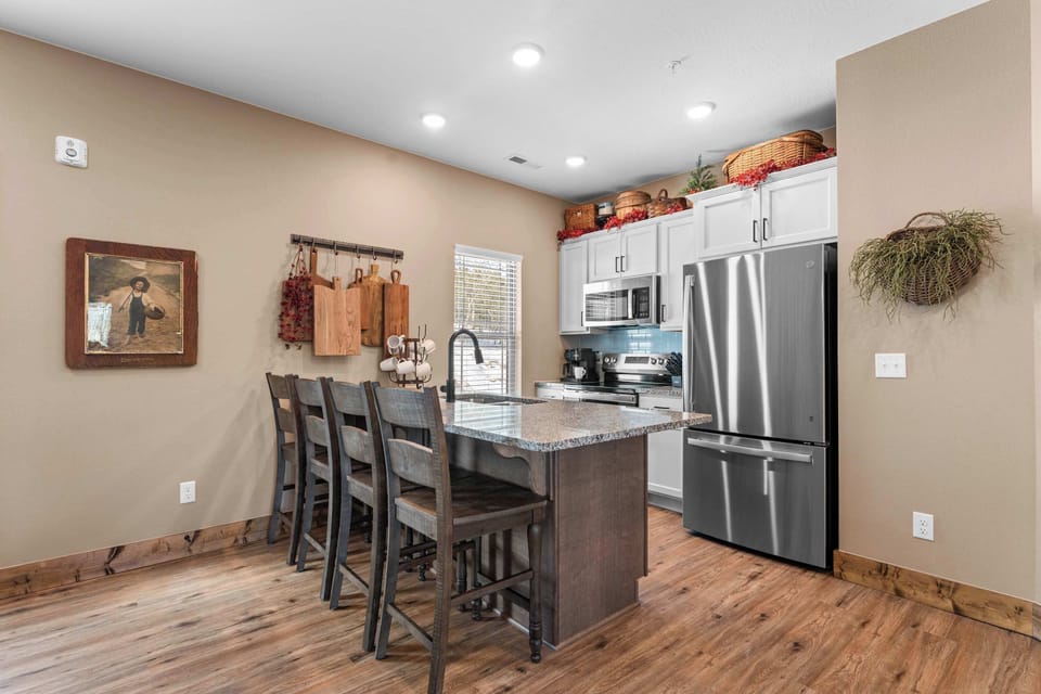 The open kitchen offers ample space & all the comforts of home​