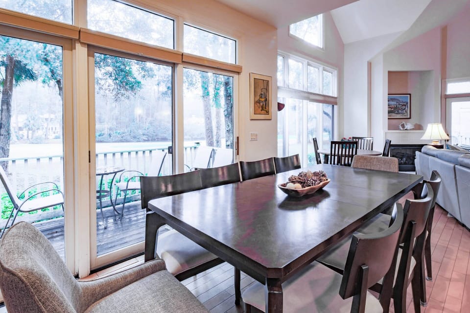 The large dining table seats 9, the smaller dining table seats 4 and there is an additional dining table outside.