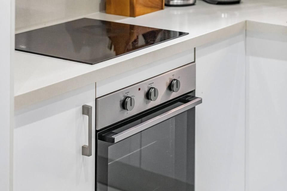 Cook with ease in the modern kitchen, featuring a ceramic cooktop, oven and generous bench space for meal preparation. Bright finishes, quality appliances and a practical layout make preparing breakfasts, lunches and family dinners simple every day.