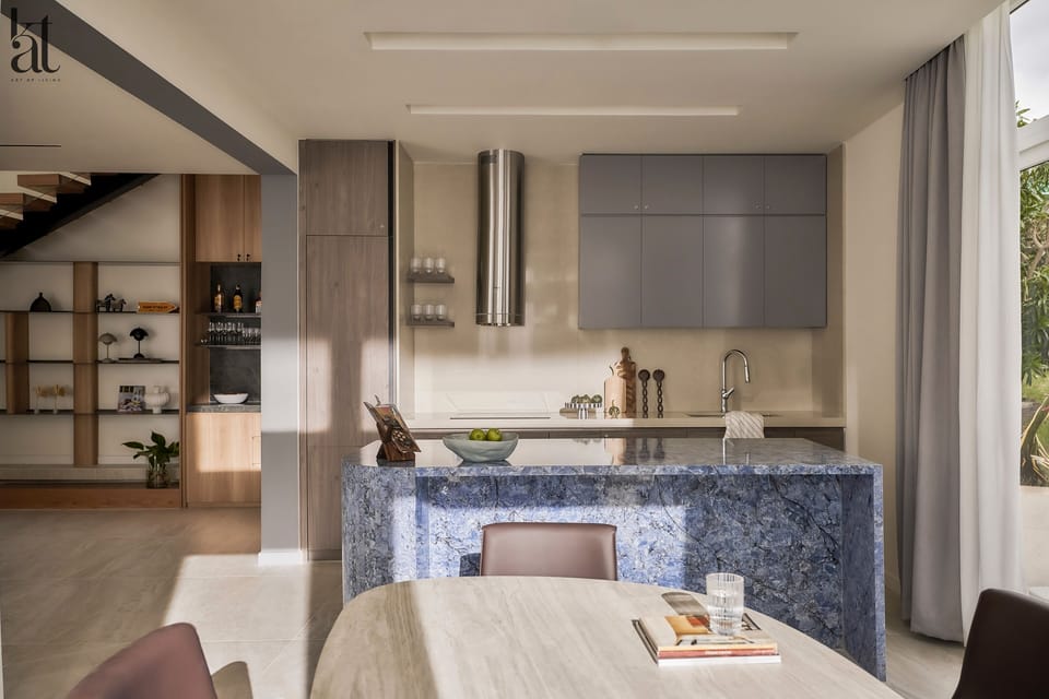 Modern kitchen has stove, oven and microwave.
