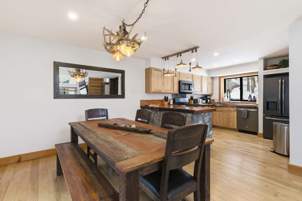 Open layout connects the dining space and kitchen for easy gathering and shared meals.