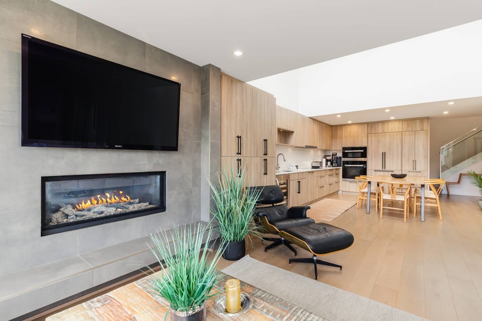60" Wall mounted TV and Gas fireplace