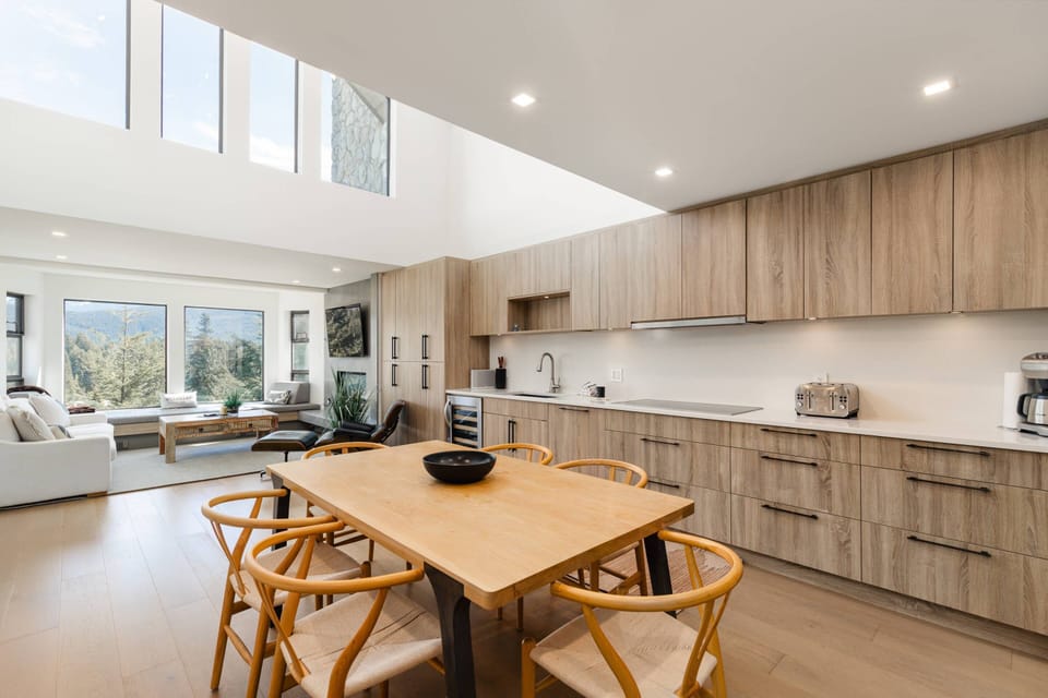 Huge vaulted ceiling give this penthouse a grand feeling throughout