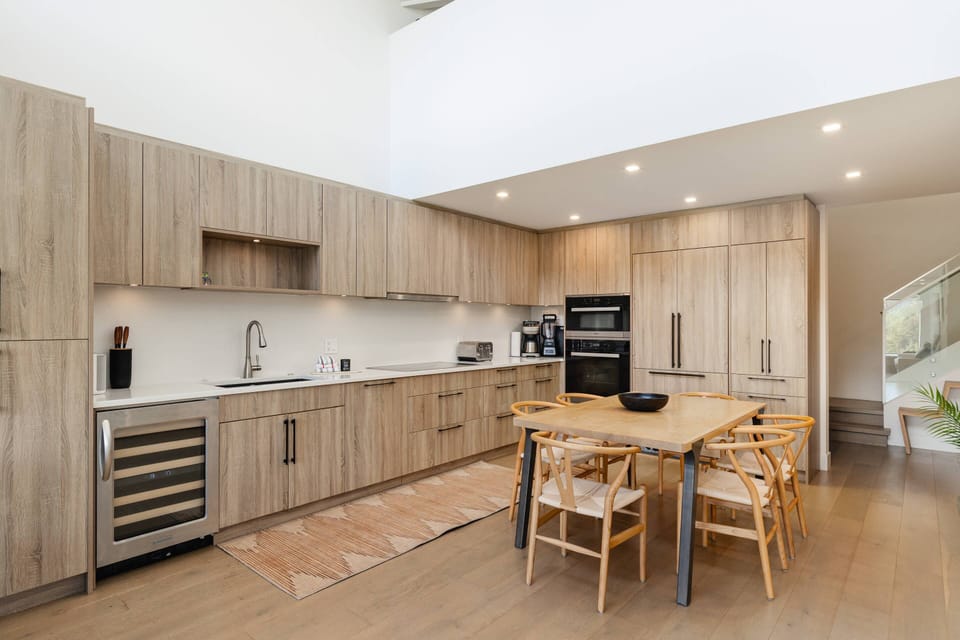 Huge well laid out kitchen for meal prep and dining
