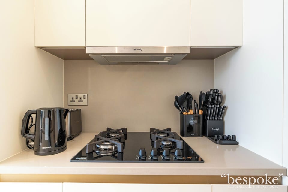 Deluxe Apartment, 2 Bedrooms, Partial Sea View | Private kitchen | Fridge, microwave, oven, stovetop