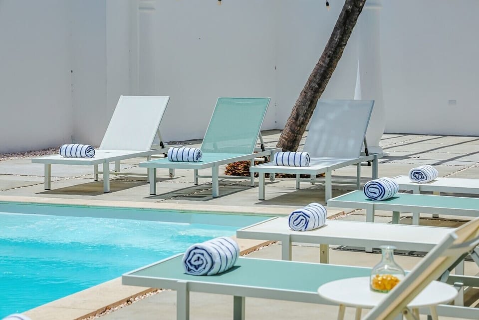 Stretch out on the loungers, take a dip, and enjoy sunny days by the pool—an easygoing space made for relaxing and unwinding.