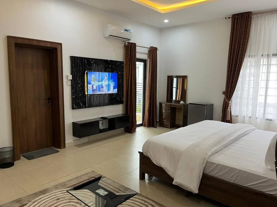 Family Room, Balcony, City View | Desk, laptop workspace, blackout drapes, soundproofing